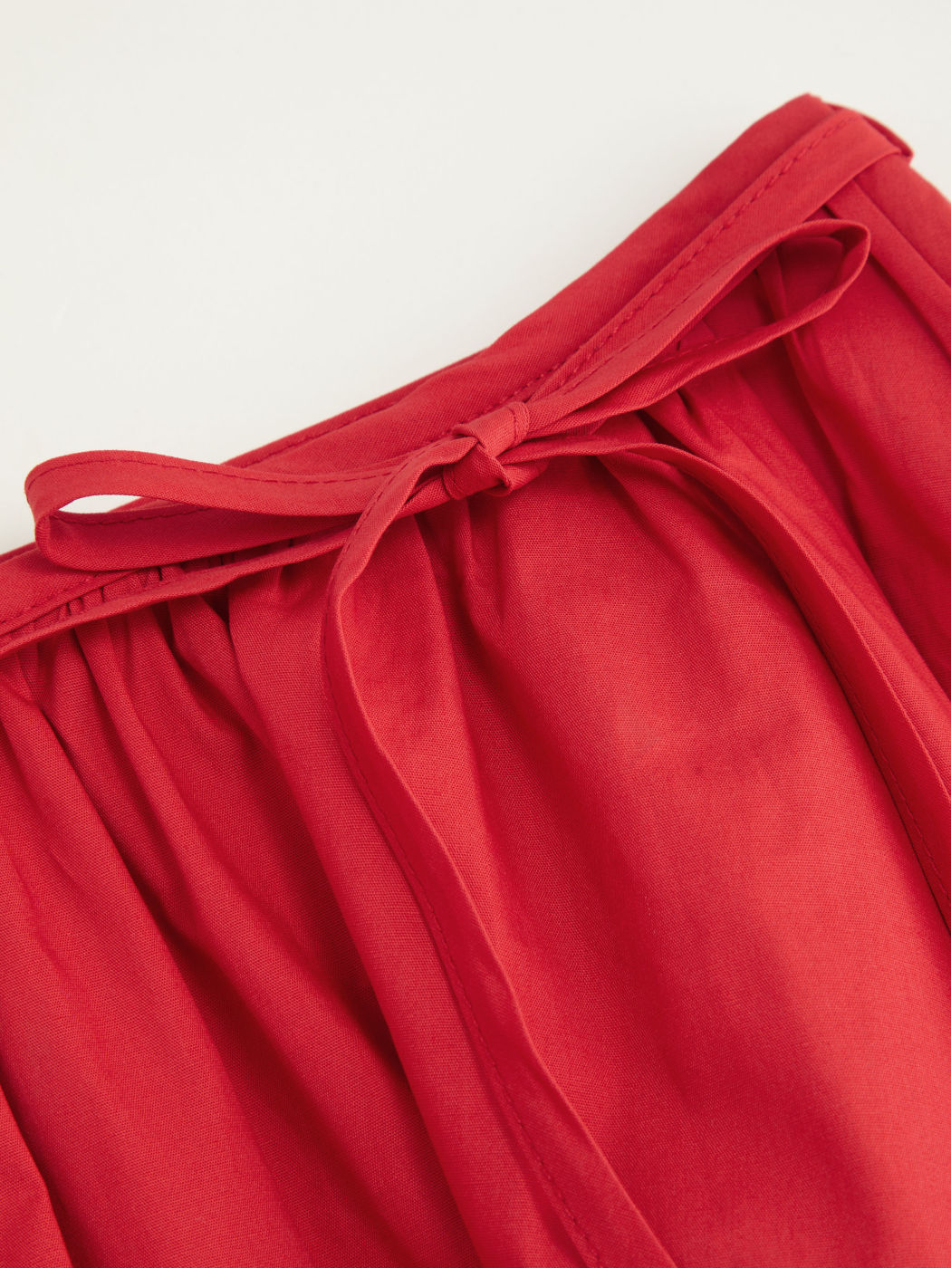100% Cotton Broderie Anglaise Tie Front Bow Top & Voluminous 100%Cotton Mid Rise Knotted Ruffle Midi Skirt