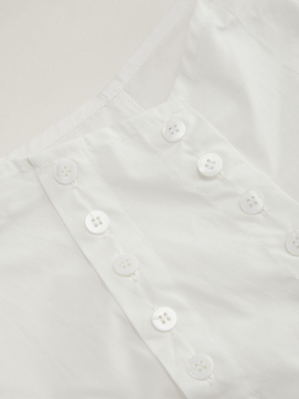 100% Cotton Asymmetrical Neck Button Curved Hem Short Sleeve Blouse