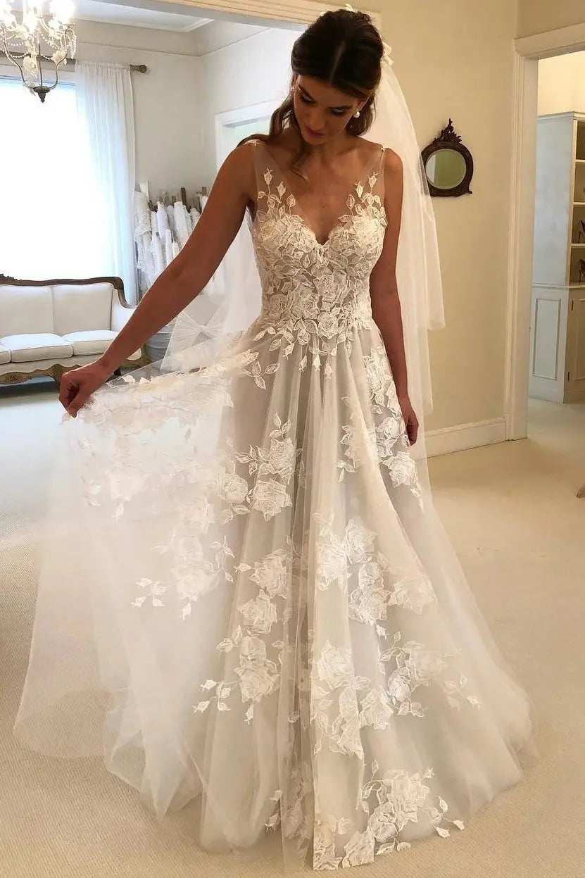 A-Line/Princess V-neck Sleeveless Sweep/Brush Train Applique Tulle Wedding Dresses