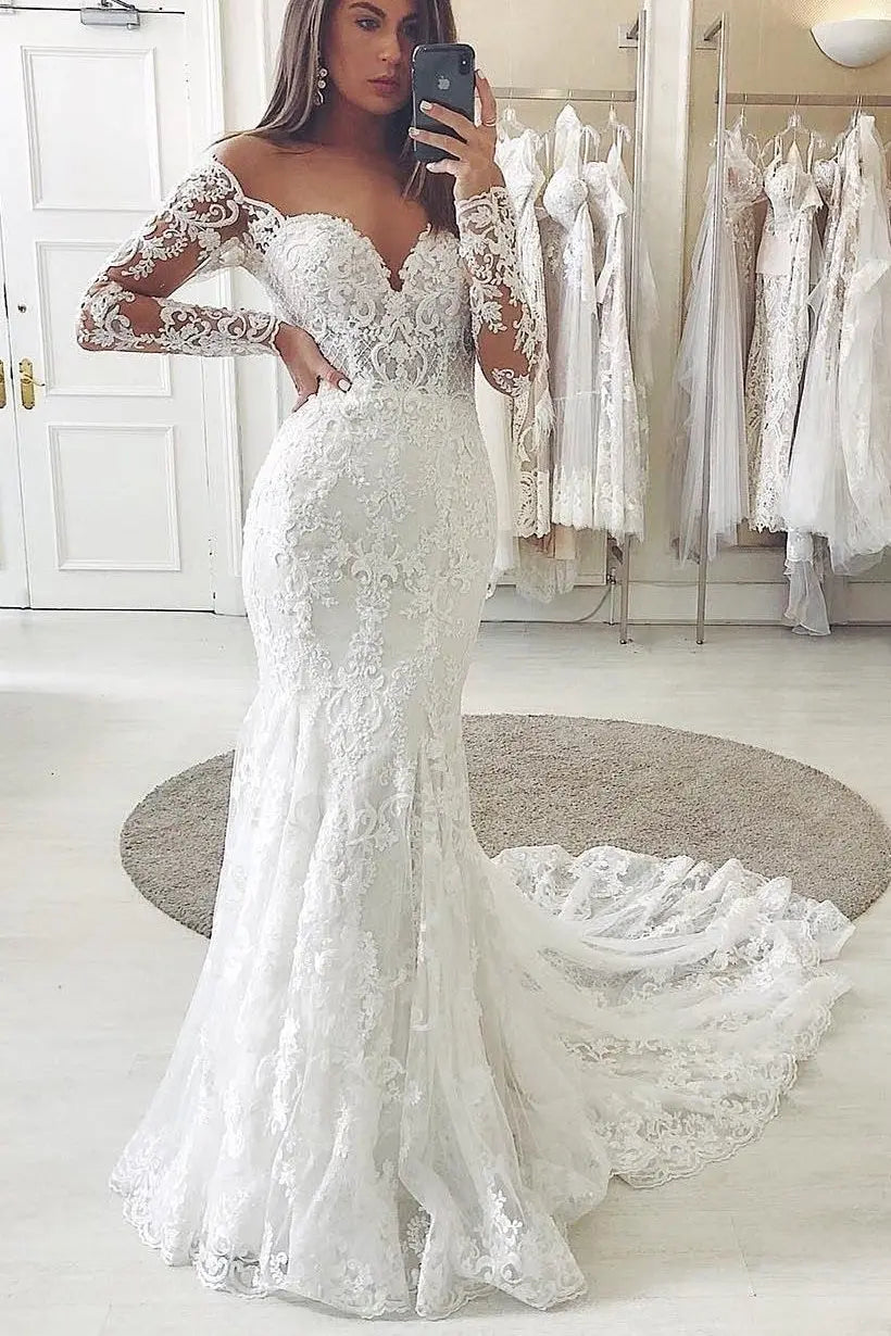 Trumpet/Mermaid Tulle Applique Off-the-Shoulder Long Sleeves Chapel Train Wedding Dresses