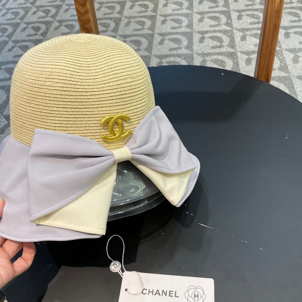 BOW BUCKET HAT IN PALE PURPLE MIX BEIGE RAFFIA 426169