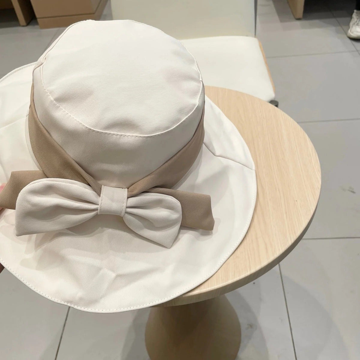 CELINE 25S BUCKET HAT 735013 IN IVORY